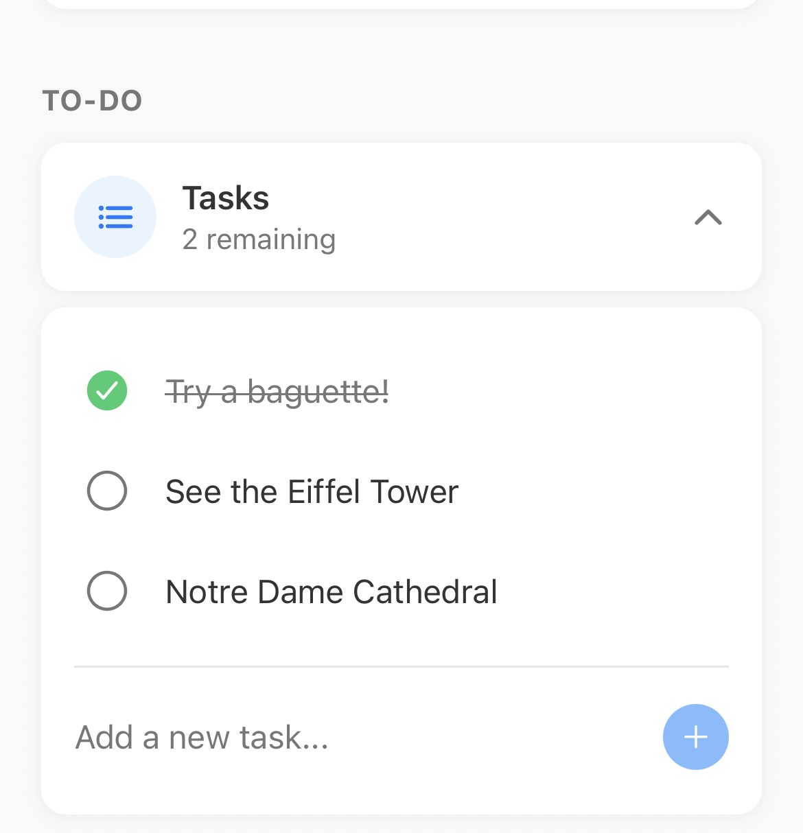 Planit to-do list showing tasks for Paris including Try a baguette (completed), See the Eiffel Tower, and Notre Dame Cathedral